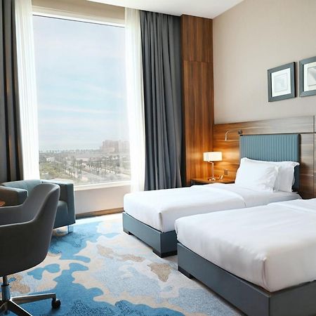 Bay La Sun Hotel And Marina - Emaar King Abdullah Economic City Экстерьер фото A room at the hotel