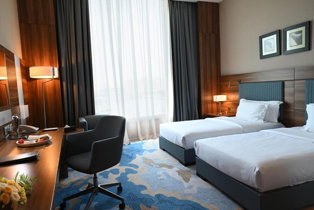 Bay La Sun Hotel And Marina - Emaar King Abdullah Economic City Экстерьер фото A room at the hotel