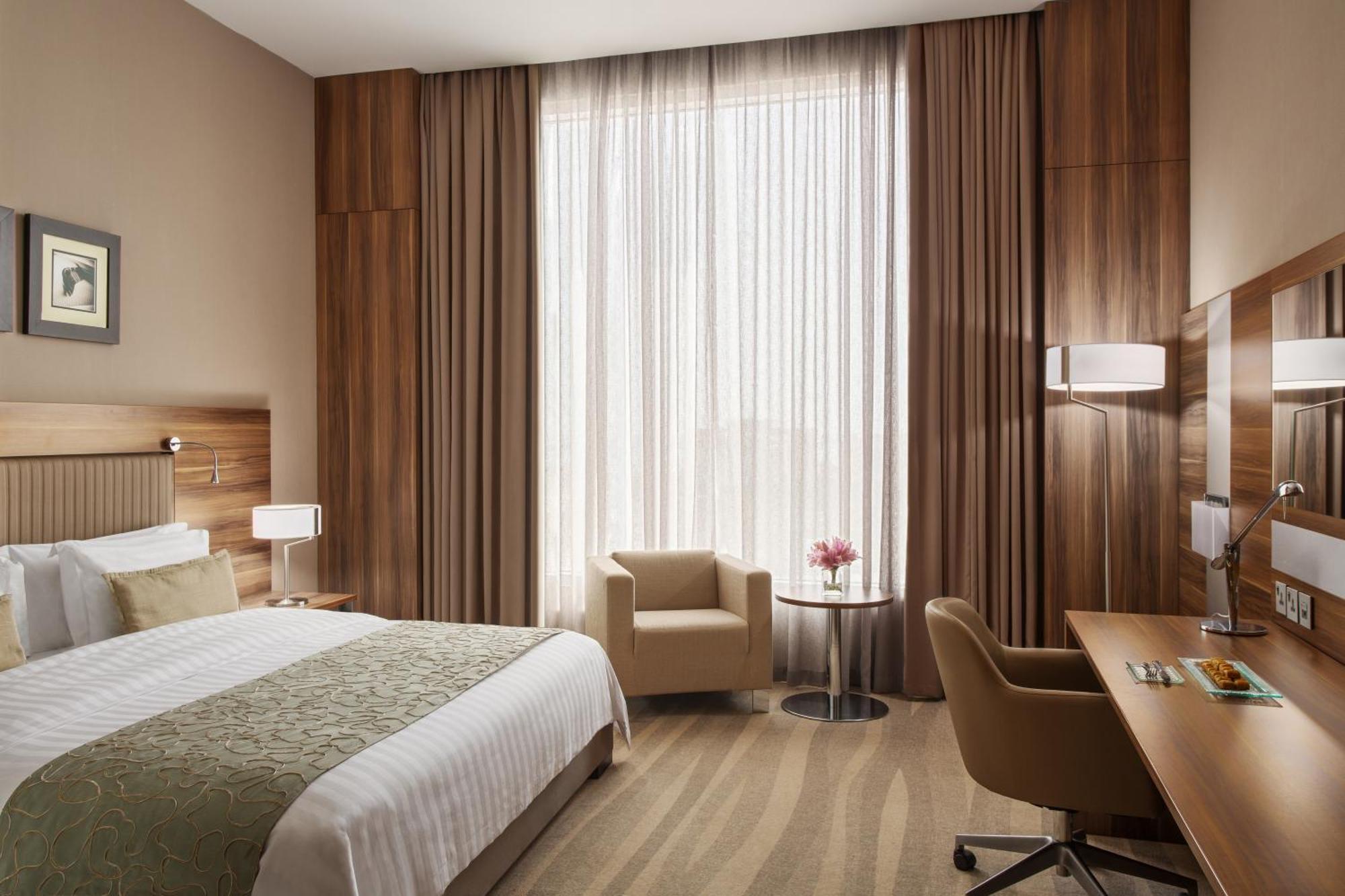 Bay La Sun Hotel And Marina - Emaar King Abdullah Economic City Экстерьер фото A room at the hotel