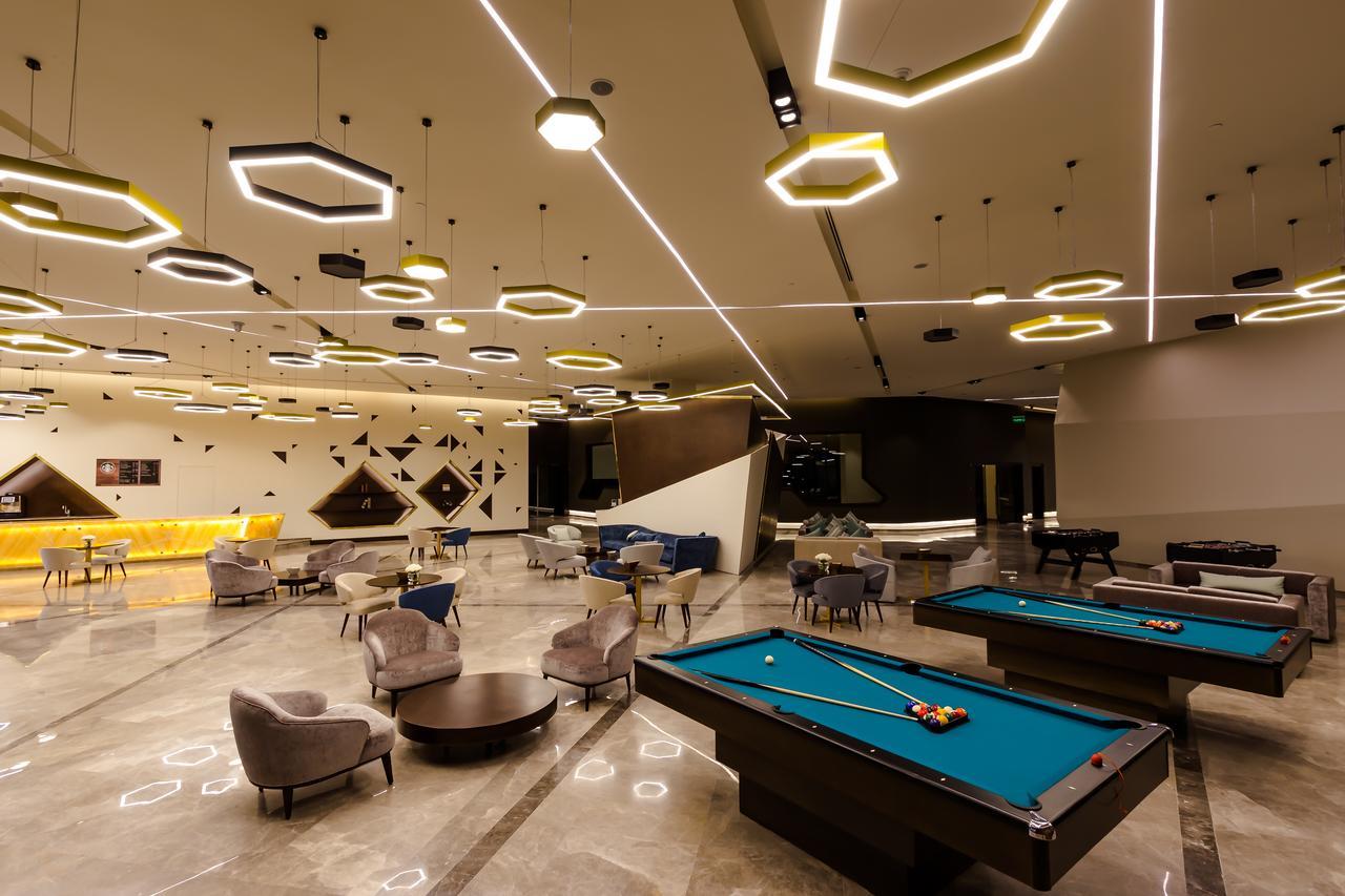 Bay La Sun Hotel And Marina - Emaar King Abdullah Economic City Экстерьер фото The lounge at the airport